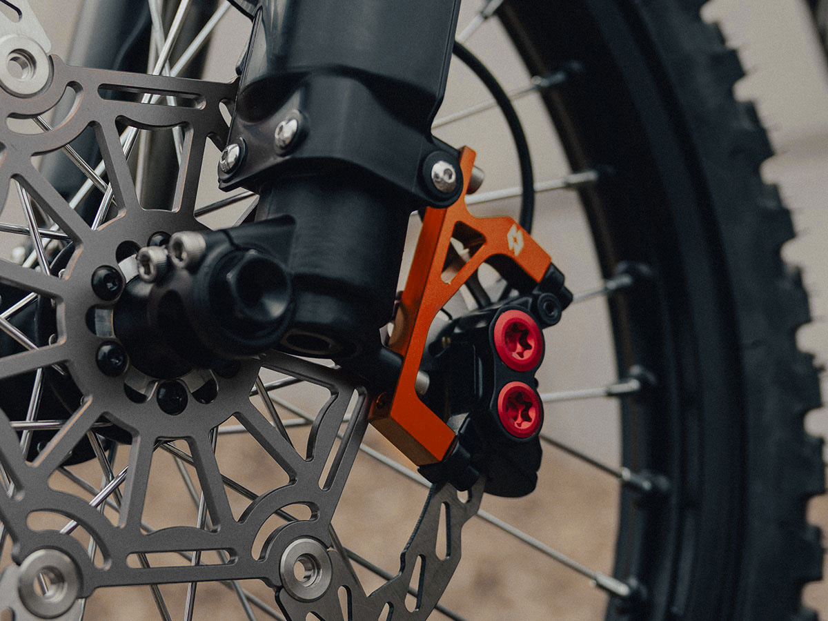 Full-E Charged Front Brake Caliper Bracket for 250mm Oversized Disc Orange